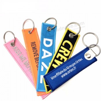 china gepersonaliseerde custom geborduurde patch gepersonaliseerde sleutelhangers met 5A kwaliteit