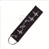 borduurwerk promotie gepersonaliseerde sleutelhangers ecg logo