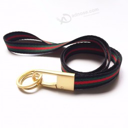 Luxury Golden Heavy Duty Metal Car Keychain with Classical Soft Stripe for phones