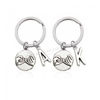 Couple key buckle with a single letter