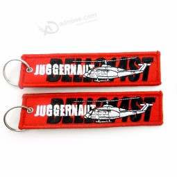 China manufacturer promotional custom fabric flight tag embroidered cool keychains tagribbons