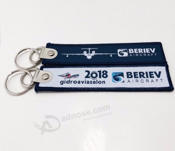 Porte-clés de nom de tissu de jet personnalisé bon marché / cool porte-clés étiquette / porte-clés pour la sécurité des vols aériens