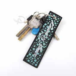 Factory Direct Price Fabric Key Tag Labels Customized Brand Promotion Gifts Woven cool keychains tag for Clothes