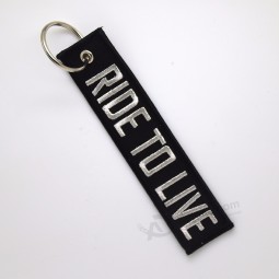 Großhandel benutzerdefinierte Stickerei Twill Pilot cool Schlüsselanhänger Tag