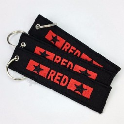 Cheap personalized custom made embroidered fabric cool keychains tag
