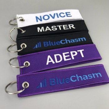 Porte-clés de vol brodé personnalisé / porte-clés