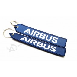 portachiavi personalizzati con jacquard logo tagliato a laser con anelli
