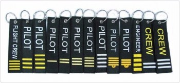 benutzerdefinierte weiße Öse Overlock Stickerei Jacquard gewebt personalisierte Schlüsselanhänger