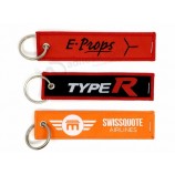 gepersonaliseerde logo geweven gepersonaliseerde sleutelhangers met metalen ring