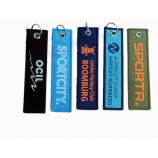 aangepaste logo geweven sleutelhanger voor motorfiets met metalen ring