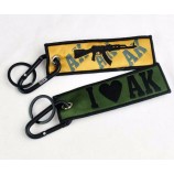 textiel gepersonaliseerd logo geweven gepersonaliseerde sleutelhangers voor motorfiets met metalen ring