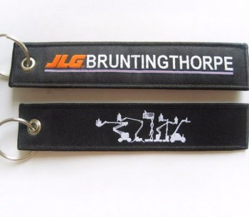 金属リングが付いているオートバイのための織物の注文のブランドによって編まれる個人化されたキーホルダー