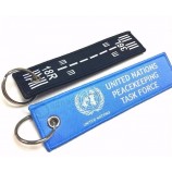 in de fabriek aangepaste lanyard geweven gepersonaliseerde sleutelhangers voor kleding met metalen ring