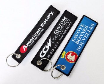 Vente en gros de porte-clés personnalisés tissés personnalisés avec boucle en métal