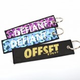 gouden metalen draad metalen merklogo flash geweven Sleutelhangers voor handtassen