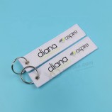 dubbelzijdig logo vliegtuig geweven sleutelhangers voor relatiegeschenken