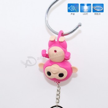 Porte-clés de lampe de poche singe porte-clés LED avec son