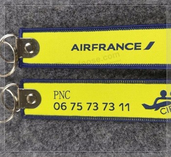 aangepaste logo stof geweven gepersonaliseerde sleutelhangers voor kleding