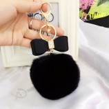 echte pompon frauen schmuckstücke leder bogen strass schlüsselbund charme pompon schlüsselanhänger flauschigen kaninchenfell ball schlüsselanhänger für autotasche