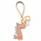 Mignon dinosaure porte-clés porte-clés Coton rembourrage dessin animé PU cuir porte-clés ananas chat Llavero voiture porte-clés sac charme