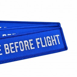 10 PCS / LOTE retire antes del vuelo llaveros para motocicletas bordado azul Llavero para regalos de aviación Llaveros OEM Llavero