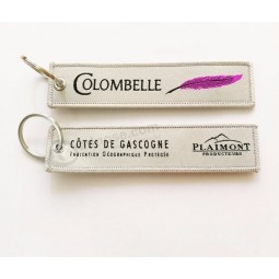 portachiavi personalizzato con logo in tessuto per moto con anello in metallo
