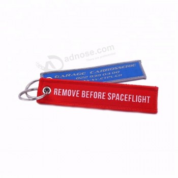 Großhandelsgewohnheit zwei Seiten Abzugsleinenstickerei keychain / keytag / keyring