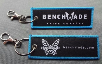 Schlüsselanhänger mit doppeltem Logo für Kleidungsstücke und personalisierten Metallring-Schlüsselanhängern