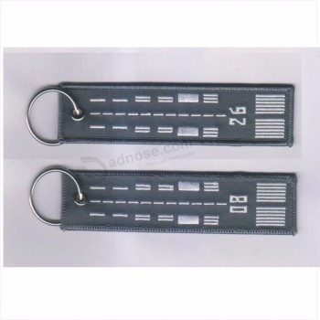 Logo de broderie argentée de luxe personnalisé supprimer la piste brodé cool porte-clés tag