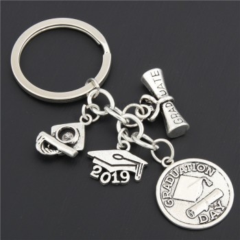 Graduierungszeremonie-Erinnerungsgeschenk-Abschlusskappenabsolventdiplom keychain Frauen Mannschlüsselring