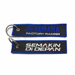 dongguan cheap promotion gift oem company logo name motorcycle key holder ring chain fabric tag custom embroidery keychain