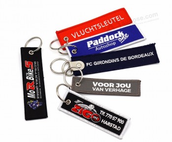 Wholesale China Custom Design Your Own Fabric Key Chain Key Ring Advertisting Souvenir Airplane Woven Embroidered Key Tag for Promotion Gift