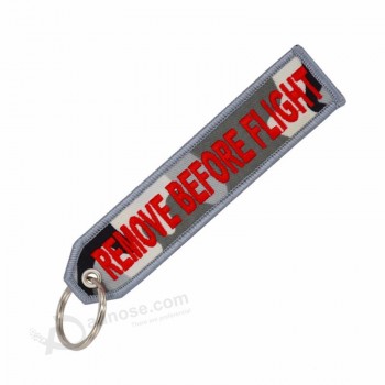 entfernen Sie vor Flugart und weise etikettiert keychain Schlüsselringrechteck-Polyester-Stickereimeldung 13 * 3CM Mehrfarben 1 Stück