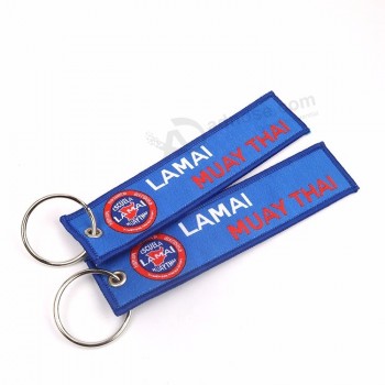Étiquette porte-clés en tissu de prix direct d’usine Cadeaux de promotion de marque personnalisés Porte-clés tissés pour vêtements