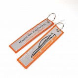 orange merrow border double side name logo fabric labels plain woven Car keychains