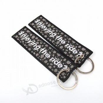 anillo de metal merrow border doble cara letras logo tejido tejido llavero para bolsos