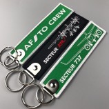 wholesale custom hot selling factory custom logo flight embroidery keychain