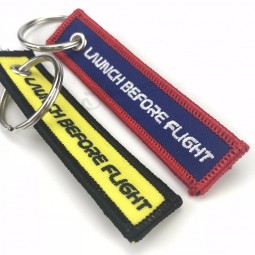 échantillon gratuit personnalisé Emoji Strap différentes émoticônes en peluche broderie Porte-clés