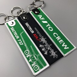 Vente en gros de porte-clés brodé de conception personnalisée avec votre propre logo