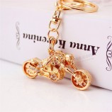 Diamantes de imitación pavimentado cráneo de metal motocycle colgante llavero del coche anillos