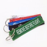 China mais novo design tecido tecido etiqueta esporte chaveiro bordado personalizado chaveiro