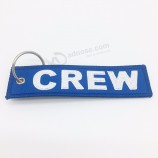 Hete verkoop aangepaste kleurrijke logo borduurwerk sleutelhanger