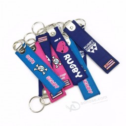 Fashionable high quality embroidered woven keychain for motorcycle