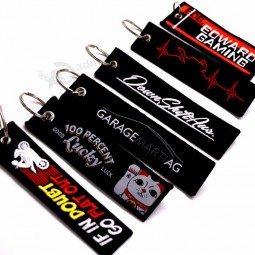 dongguan fabrieksstof Key Tag-labels aangepaste merkpromotie geschenken geweven sleutelhangers