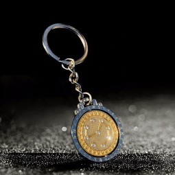 aangepaste bedrijfslogo sleutelhanger spinnen vergulden diamanten munt sleutelhangers