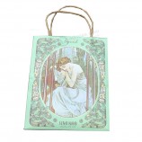 Sacs d’emballage cadeau personnalisés en papier vert avec poignée