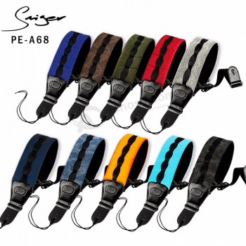 Vente en gros Rembourrage personnalisé de haute qualité Sangles de guitare en cuir PU avec porte-pic