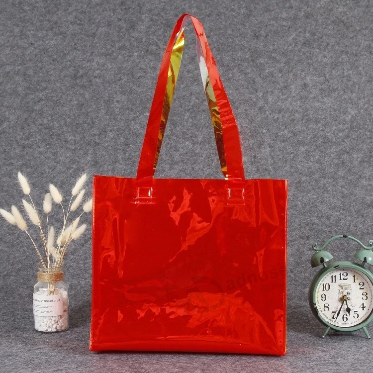 Commercio all'ingrosso di fabbrica in plastica PVC tote Bag colore Tote shopping bag laser Abbigliamento regalo Stampa di sacchetti di imballaggio