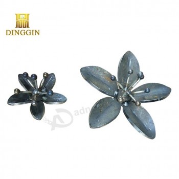 decorative ornamental forged wrought iron leaves and flowers