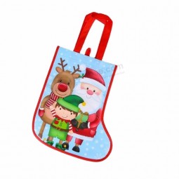 卸売エコフレンドリーなサンタ漫画パターン不織布バッグ靴下の形のクリスマスクリスマスギフトエコバッグの特別なギフトパッケージ
